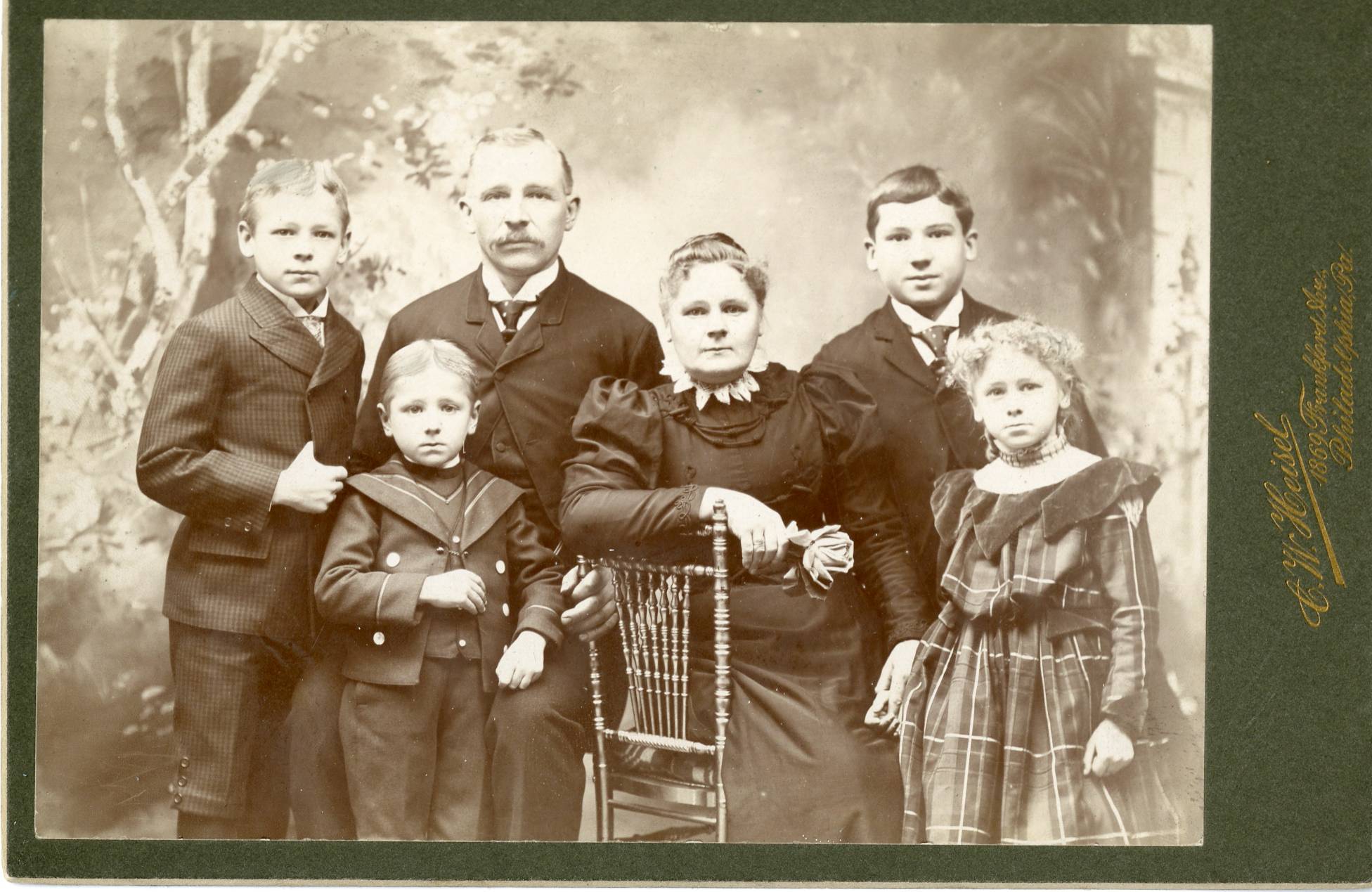 cabinet card featuring family circa 1900